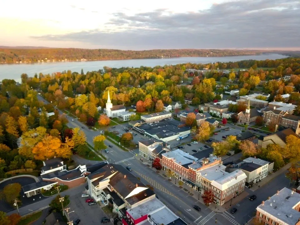 Aerial view of Cazenovia village and Cazenovia Lake in autumn